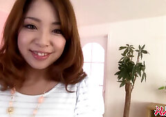 Naughty Japanese chick Mirei Oomori rubs her hairy pussy,uncensored.