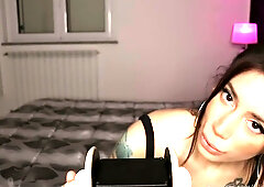 Tattooed Ellie delivers surreal ASMR ear massage and gentle blowing in solo webcam session