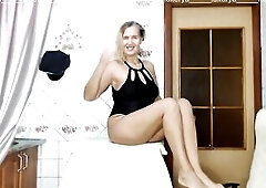 Hawt, midst-older Lukerya likes to swim in the pool, but during the pandemic it became impossible. So that babe puts on a shiny ebony swimsuit and fan