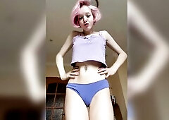 Soft pink hair, hands on thighs, legs apart ?