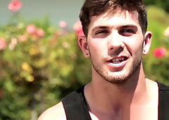 Athletic jock tugging his cock at the gym