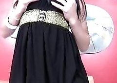 Attractive shemale teases with strawberries and tugs her hard prick