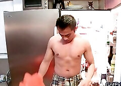 Asian dude jerking his cock