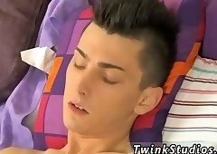 Cute boys making out on a bed