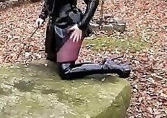 latex girl with long nails and sexy boots