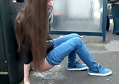 Slim long haired brunette amateur teen pissing in public places