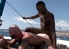 Franco Cento and Sandro on a boat