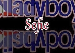 Gorgeous shemale performs a sensual striptease before stroking her shaft