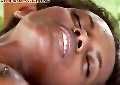youthful ebony woman gives a fleshly massage to one more