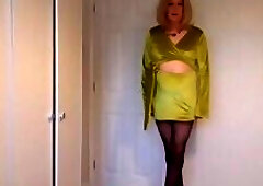 Taking my green dress off in black pantyhose and heels