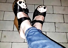 crossdresser on a night walk in a public park, showing off hot feet and hawt shoes