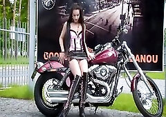 Natural lengthy haired brunette hair angel makes exposed disrobe on motorbike