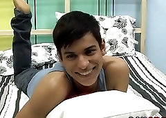 Cute twink is playing with his cock during an interview