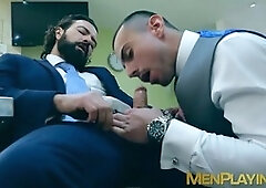 Bearded businessman Miguel Angel has a wild bareback romp with Dani Rivera in the office