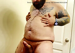 Glorious Tatted Round unshaved wolf disrobing and shooting his fountain