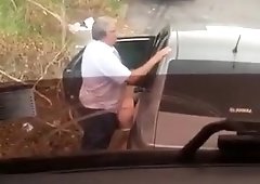 Fat old man gets caught on cam while drilling a ho outdoors