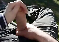 German chick jerks a cock outside in the backyard