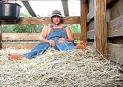 Country Guy On A Hayloft
