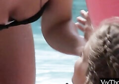 Glamorous lesbo has pleasure in the pool making her lover cum