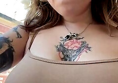 Tattooed Girl Shows Off Pierced Tits