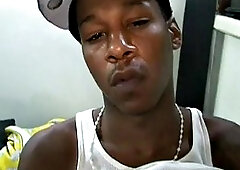 Young thin black guy in thug gear loves to jerk off his big hard shaft solo