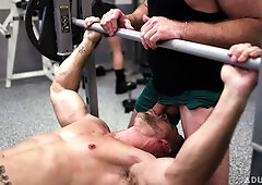 Muscular gay men fuck in front of everyone