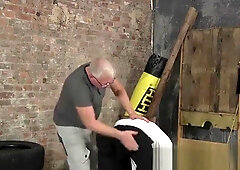 Mature master Sebastian Kane spanks and slaps his twink gay