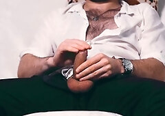 Attractive Noel Dero enjoys an intimate condom close-up while watching adult content