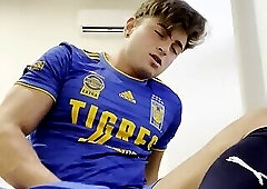 143.5 Football player jerks off in uniform after a long game